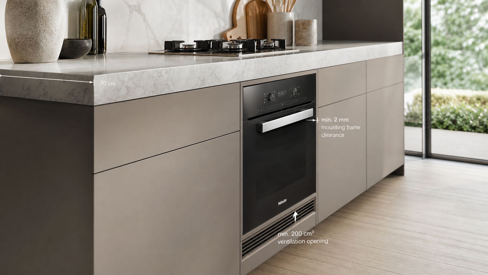 Et moderne køkken med en Miele indbygningsovn og en bordplade på 70 cm dybde i et elegant rum.